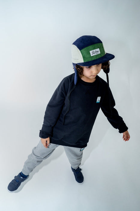 Keps, manchesterblock 5-panel med öron - Navy / grön (Storlek L, 4-7 år)